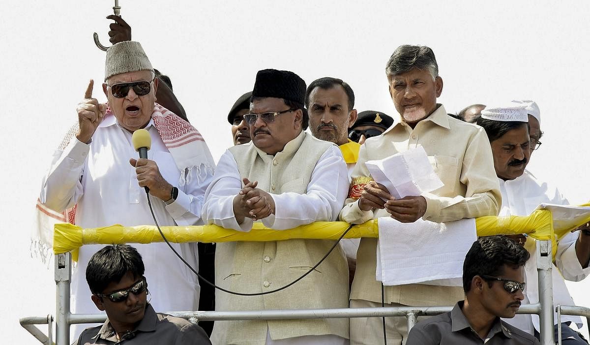 National Conference President Farooq Abdullah with Telugu Desam Party (TDP) President and Chief Minister N Chandrababu Naidu during an election campaign roadshow for TDP's MLA candidate Ameer Babu, ahead of Lok Sabha polls, in Kadapa, on Tuesday. PTI