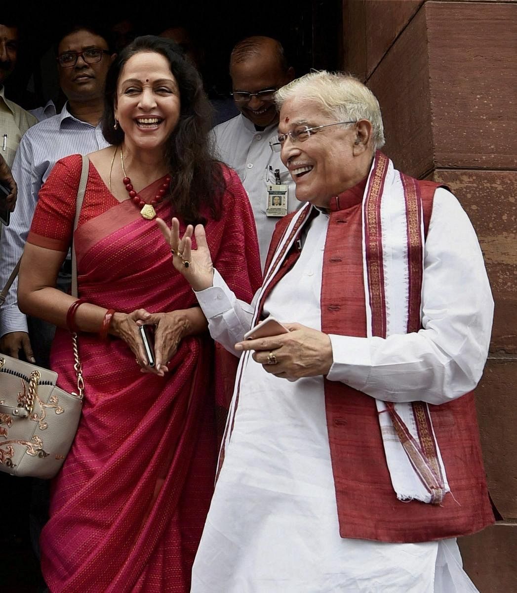 BJP MPs Murli Manohar Joshi and Hema Malini at Parliament house during the ongoing monsoon session in New Delhi. PTI FILE PHOTO