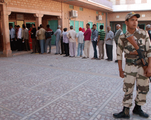 After a slow start, polling picked up rapidly as the day progressed with 20 per cent of 4.08 crore voters of Rajasthan exercising their franchise in the assembly elections till 12 noon. PTI Photo.