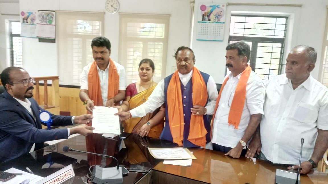BJP nominee B Y Raghavendra files nomination papers to the district election officer K A Dayananda in Shivamogga on Thursday.
