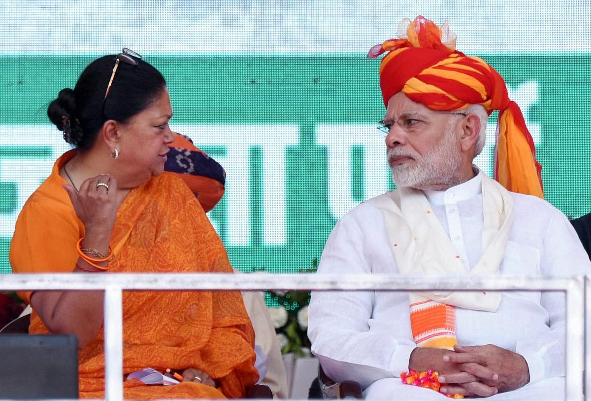 Prime Minister Narendra Modi and Rajasthan Chief Minister Vasundhara Raje during 'Vijay Sankalp Sabha', in Ajmer, Saturday, Oct 6, 2018. (PTI Photo)
