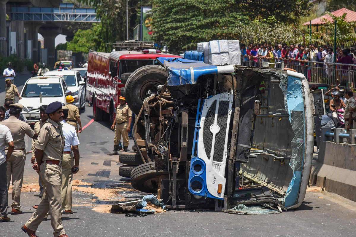 The BMTC bus which turned turtle on the up ramp of the Chord Road flyover on Wednesday. DH PHOTO/S K DINESH