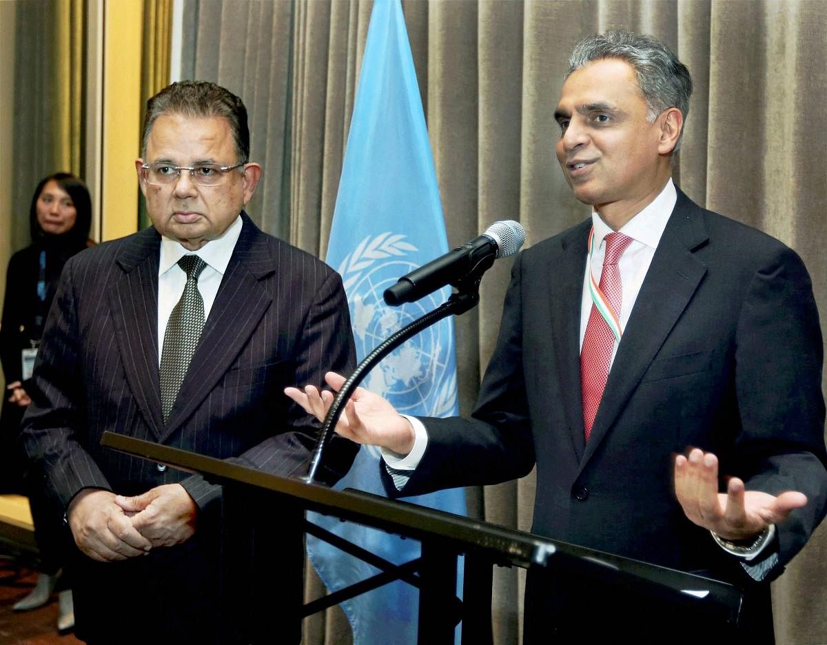 New York: India's Permanent Representative to the United Nations Syed Akbaruddin speaks during a reception in the honour of Justice Dalveer Bhandari (L) at the United Nations in New York on Monday. India's Dalveer Bhandari won the votes in the UN General
