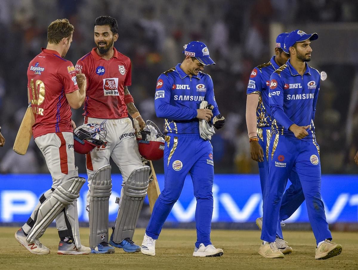 Kings XI Punjab KXIP player KL Rahul celebrates with his teammate after winning the Indian Premier League 2019 (IPL T20) cricket match against Mumbai Indians (MI) at IS Bindra Cricket Stadium in Mohali, Saturday. PTI photo