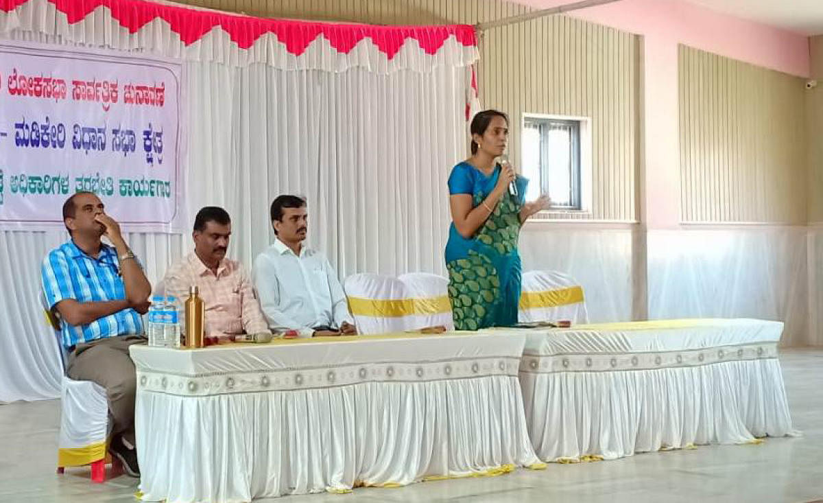 Deputy Commissioner Annies Kanmani Joy, who is also the district election officer, addresses election officers during a meeting in Madikeri on Thursday.