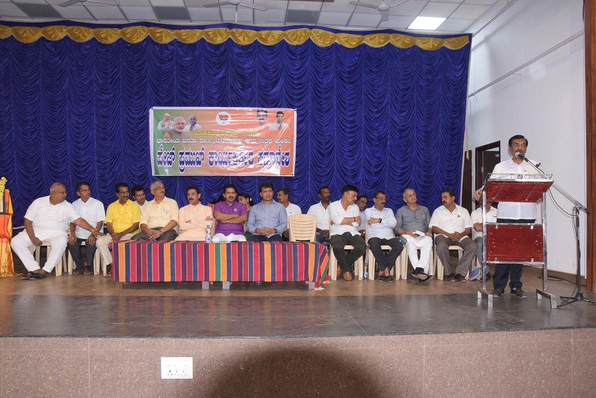 MLC Ayanur Manjunath speaks at BJP Page Pramukh’s convention at Kavoor on Friday.