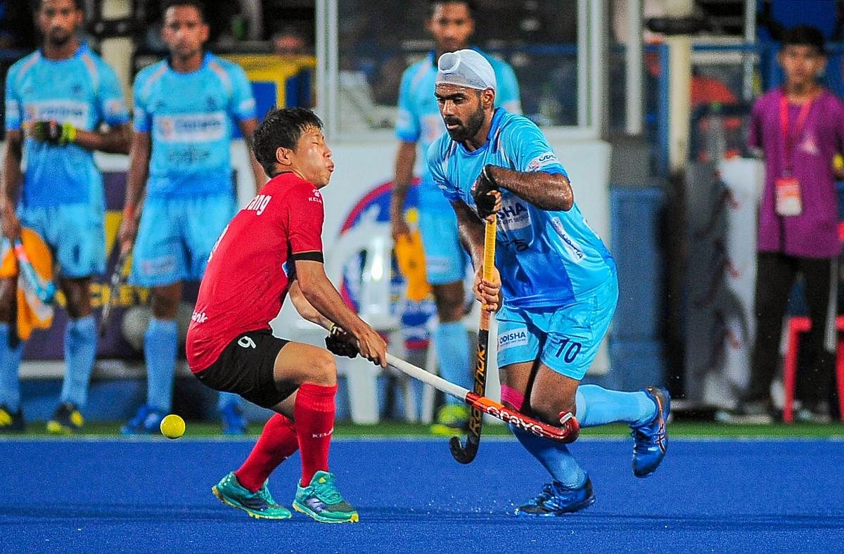 HARD TOIL: India's Simranjeet in action against Korea during the Sultan Azlan Shah Cup final on Saturday. PTI