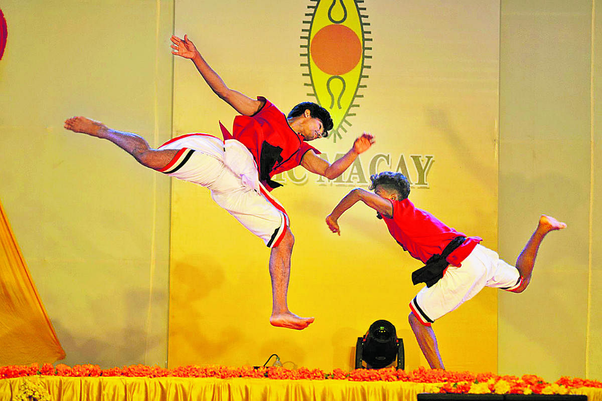 Students of Vallabhat centre of Kerala perform 'Kalaripayattu' martial art form at Bharatiya Vidya Bhavana Kodagu Vidyalaya in Madikeri on Saturday evening.