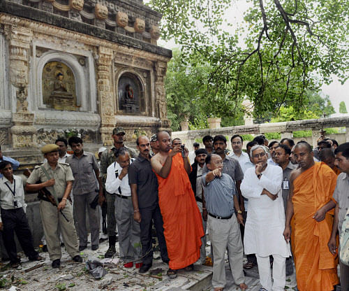 Bihar Chief Minister Nitish Kumar visit The World Heritage Mahabodhi Temple after a series of blast took place in Budh temples at Bodhgaya on Sunday. PTI Photo