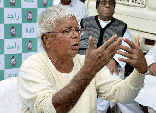 RJD president Lalu Prasad on Wednesday said an alliance with the Congress had been sealed. According to the arrangement, the RJD would contest 27 of the 40 Lok Sabha constituencies in Bihar, while the Congress would get 12, leaving one seat (Katihar) for NCP's Tariq Anwar. PTI File Photo