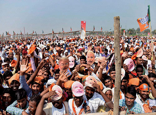 Crowd of BJP supporters during Prime Minister Narendra Modi's election rally in support of NDA candidates at Suara Airport ground in Sasaram on Friday. PTI Photo
