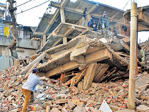 Debris: A building that collapsed in the earthquake in Manipur's capital Imphal. DEEPAK OINAM