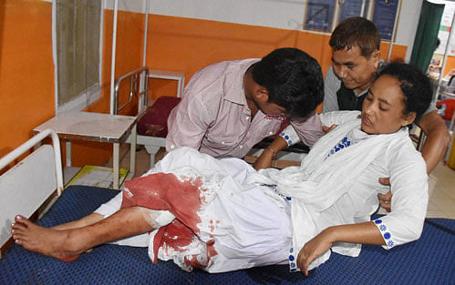 An injured brought to hospital for treatment following a suspected IED blast in Goalpara district of Assam on Monday. PTI Photo