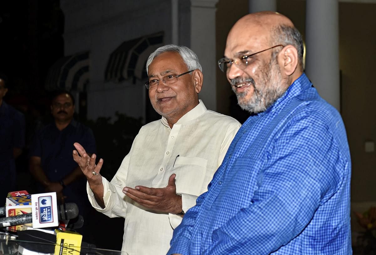 BJP president Amit Shah and Bihar Chief Minister Nitish Kumar during the announcement of the seat-sharing arrangement in Bihar. PTI