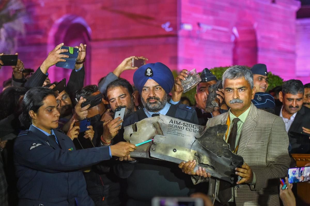 Indian Air Force officials show sections of an exploded Amraam missile, said to be fired by Pakistan Air Force (PAF) F-16s, at an IAF, Army and Navy joint press conference at South Block in New Delhi, Thursday, Feb 28, 2019. PTI file photo