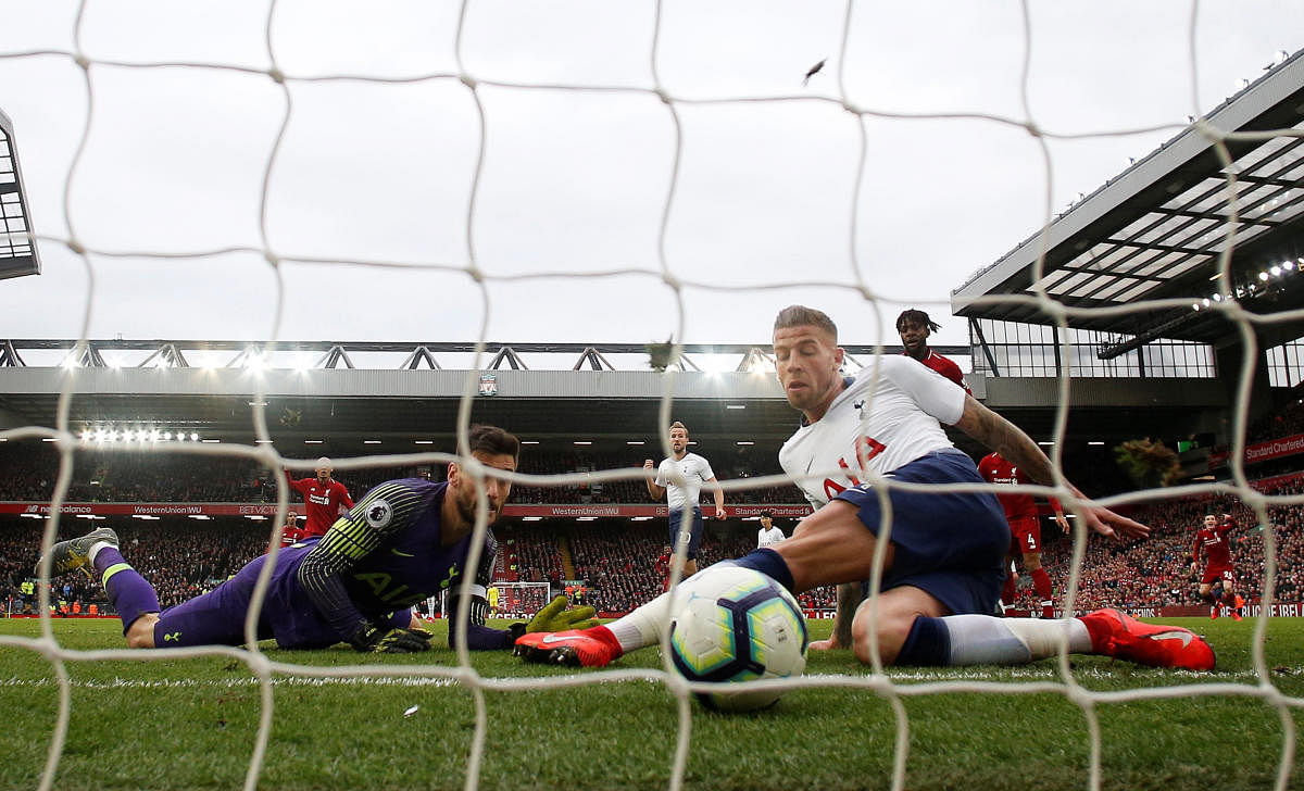 BLUNDER Tottenham’s Toby Alderweireld scores an own goal to help Liverpool eke out a 2-1 win in their EPL match at Anfield on Sunday. Reuters