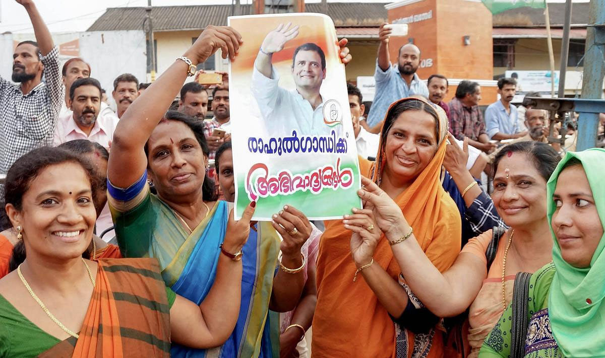 United Democratic Front (UDF) workers participate in a rally after Congress president Rahul Gandhi declared that he will contest from Wayanad Lok Sabha seat, in Wayanad, Monday, April 1, 2019. (PTI Photo)