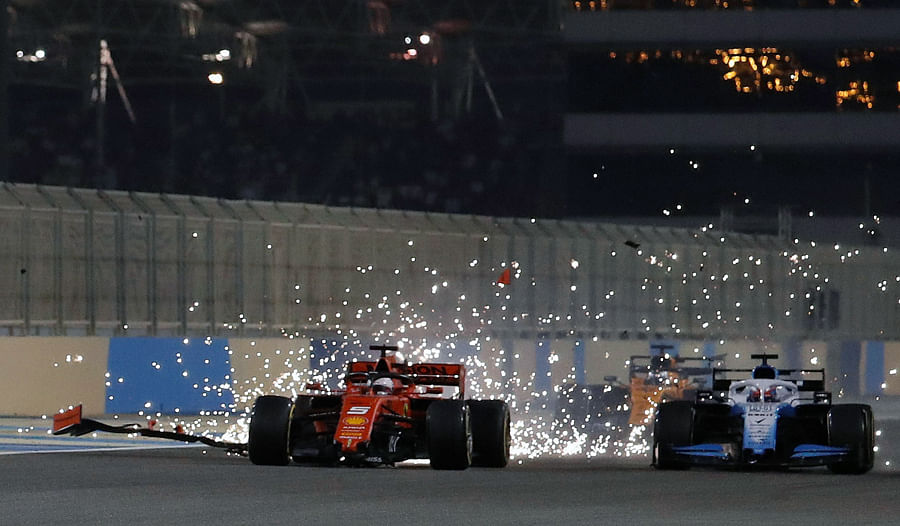 Sparks fly from Sebastian Vettel's damaged car during the Bahrain Grand Prix. Picture credit: Reuters