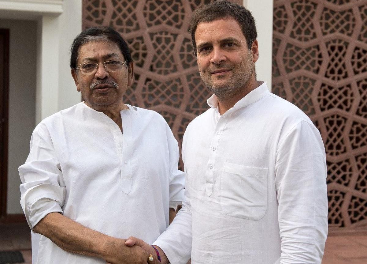 West Bengal Congress president Somen Mitra with Congress president Rahul Gandhi. File photo