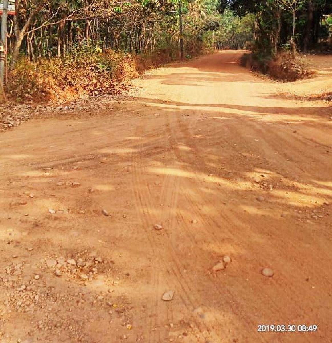 The pathetic condition of the road in Noojibalthila village.