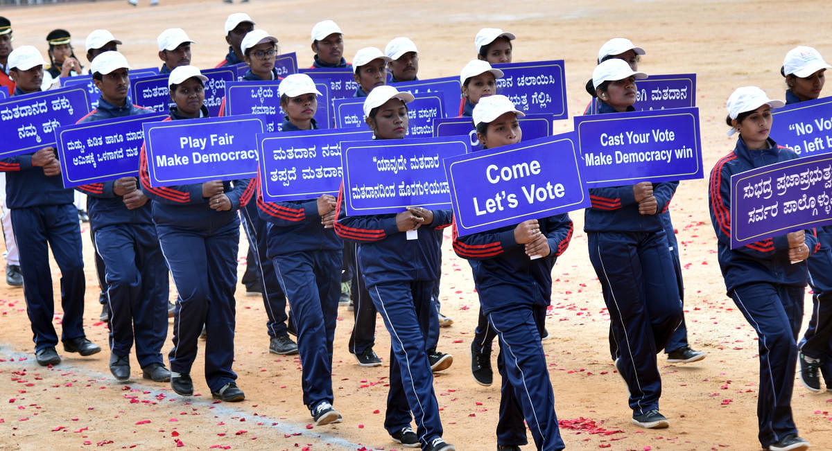 Students creating awareness on the importance of voting. DH file photo