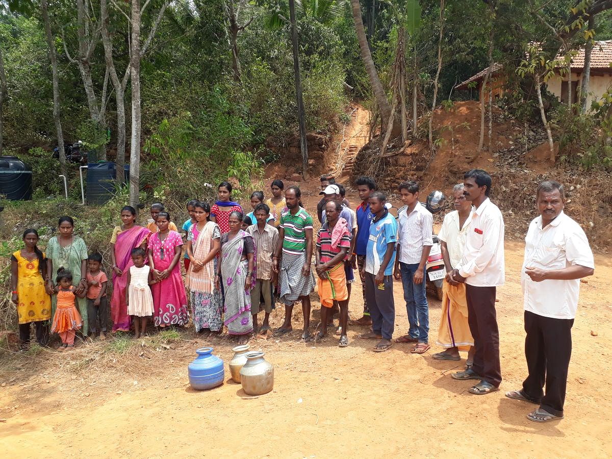 The residents of Bijala Colony in Olamogru Gram Panchayat in Puttur stage a protest on Tuesday.