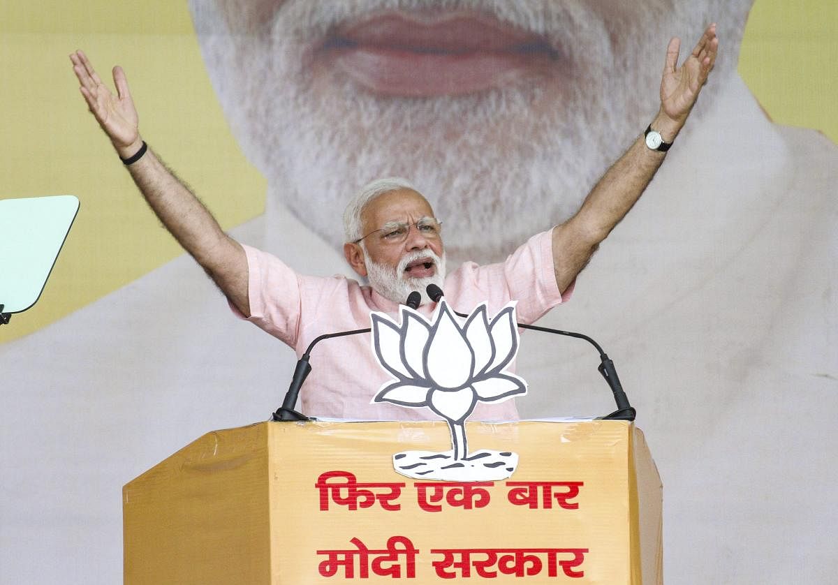 Prime Minister Narendra Modi gestures as he speaks during an election rally, ahead of the Lok Sabha polls, in Saharanpur, Friday, April 05, 2019. (PTI Photo)