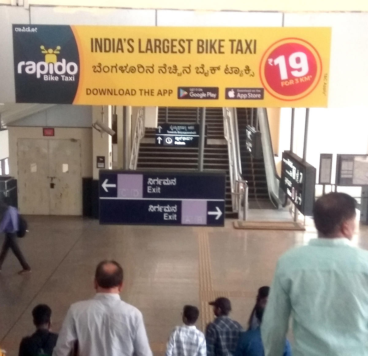 While the government has consistently maintained a ban on bike taxis, it has not prevented Rapido from displaying advertisements in prime places like metro stations. Picture from MG Road metro station.