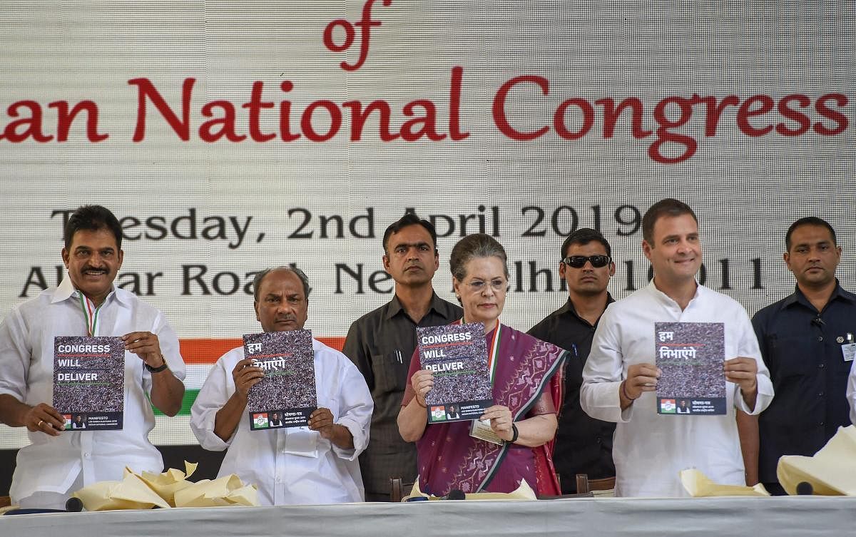 Congress President Rahul Gandhi, senior party leaders Sonia Gandhi, AK Antony and Congress General Secretary K C Venugopal release party's manifesto for Lok Sabha polls 2019, in New Delhi. PTI
