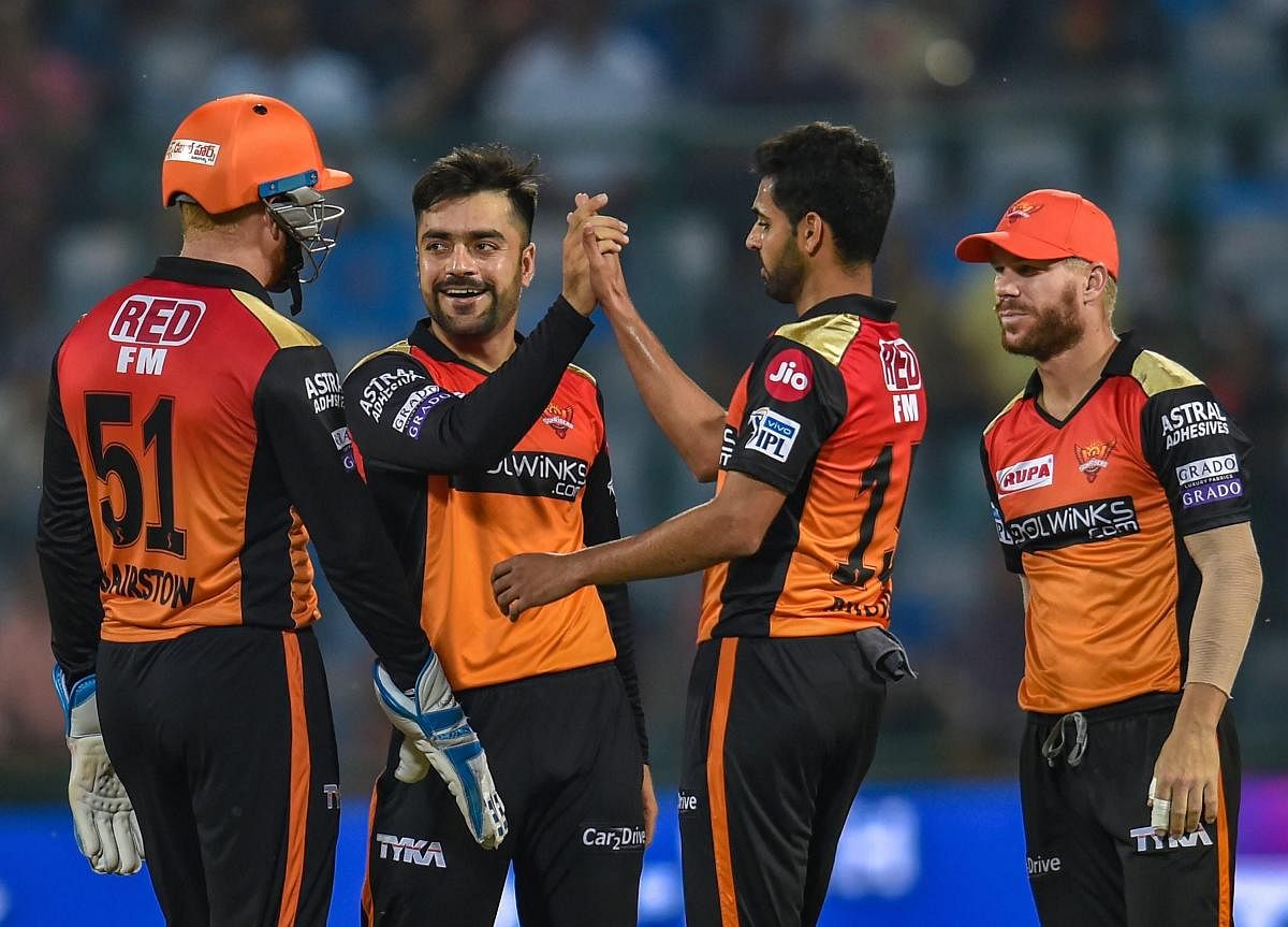 SCALPING THE BIG FISH: Sunrisers Hyderabad’s Rashid Khan (centre) celebrates with team-mates after dismissing Delhi Capitals captain Shreyas Iyer in New Delhi on Thursday. PTI