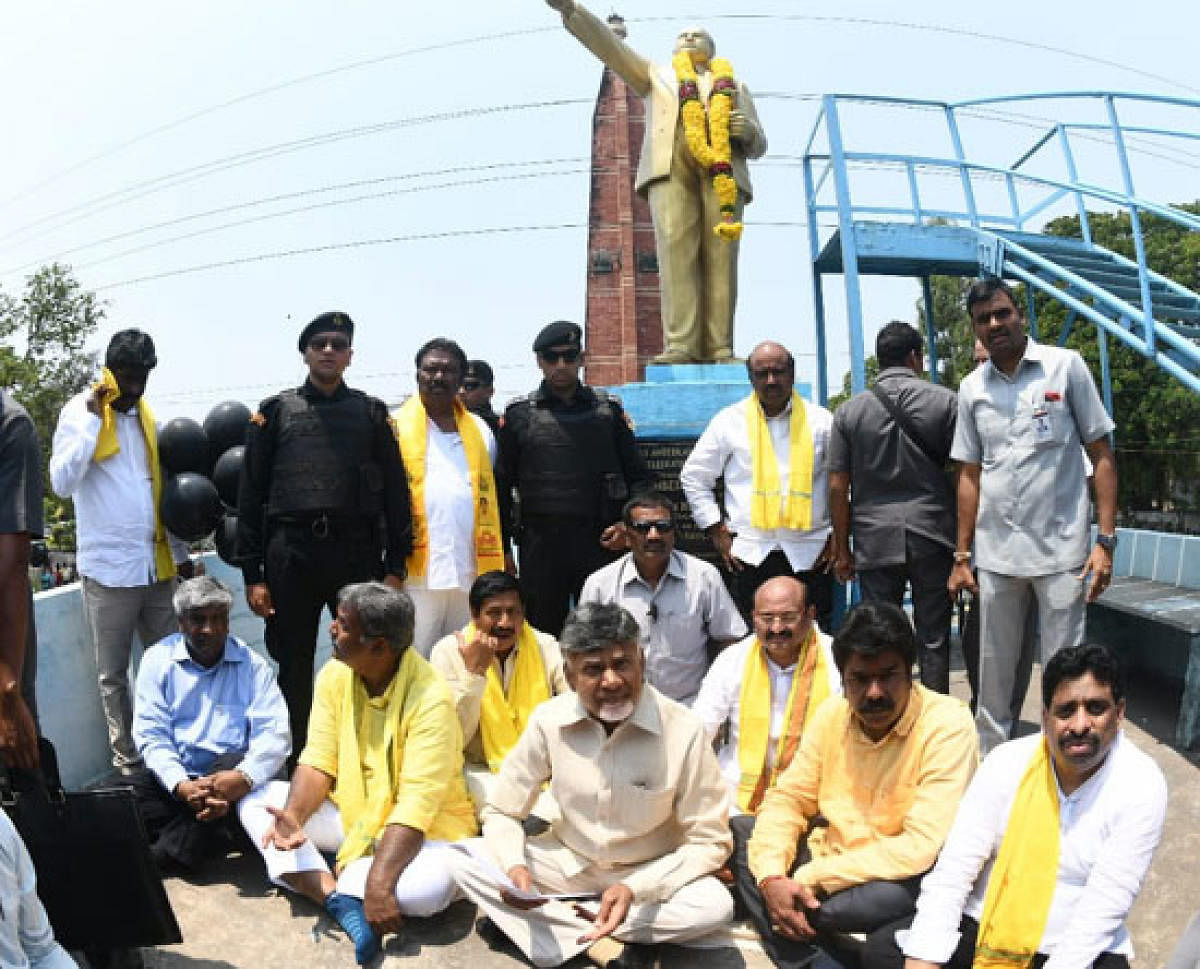 AP Chief Minister Nara Chandrababu Naidu protesting at the B R Ambedkar statue in Vijayawada on Friday.