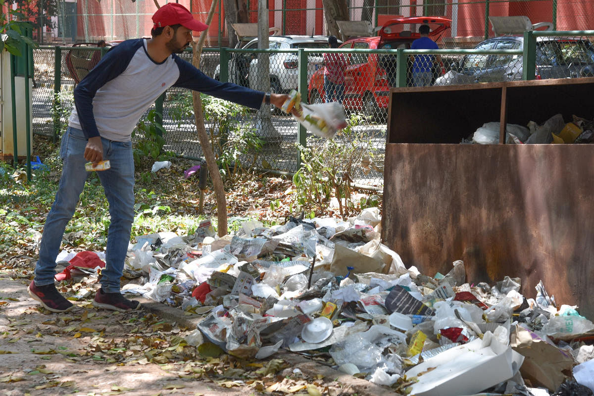 Volunteers picked waste left behind in the stadium and at Cubbon Park from 6.30 am to 8.30 am on Saturday. REPRESENTATIVE PIC