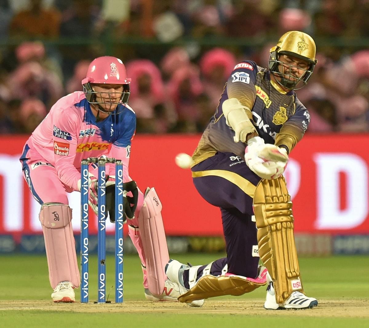 KKR's Sunil Narine sweeps one to the boundary against Rajasthan Royals on Sunday. PTI