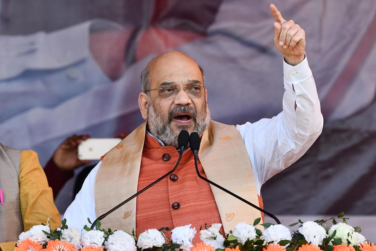 Referring to the Pulwama terrorist attack and subsequent air strike by India targetting terror camps in Pakistan, Shah asked whether Congress President Rahul Gandhi could give a fitting reply like Modi. AFP File photo