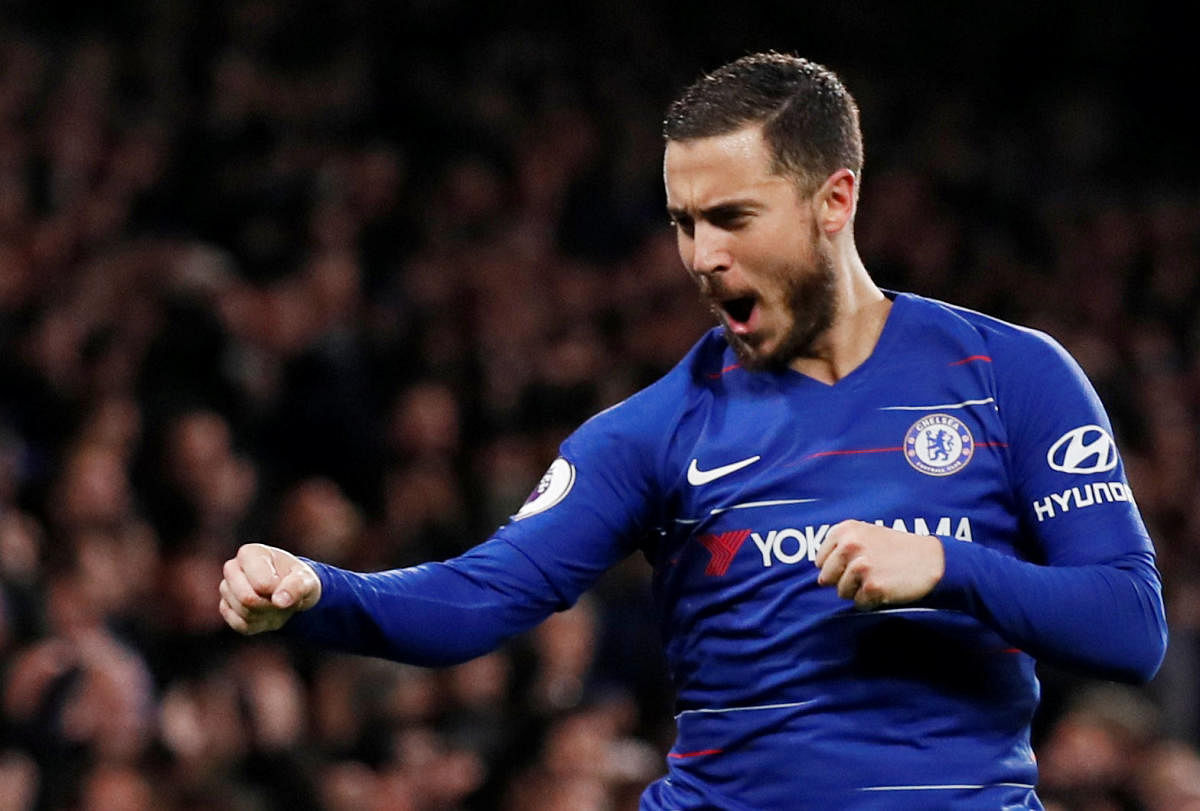 SPECIAL SHOW: Chelsea's Eden Hazard celebrates after scoring his team's second goal against West Ham on Monday. Reuters