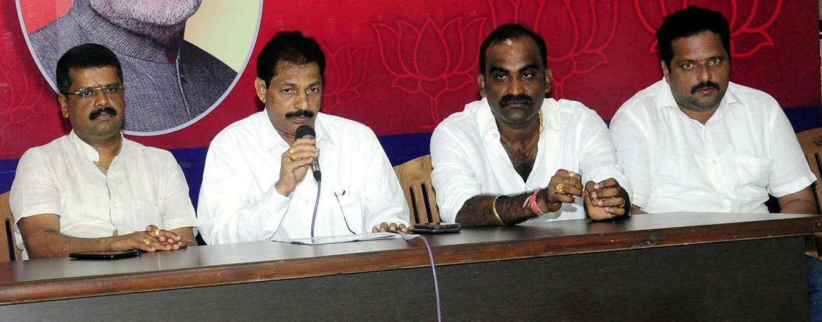 BJP Udupi district president Mattar Rathnakar Hegde speaks to reporters in Udupi on Monday.
