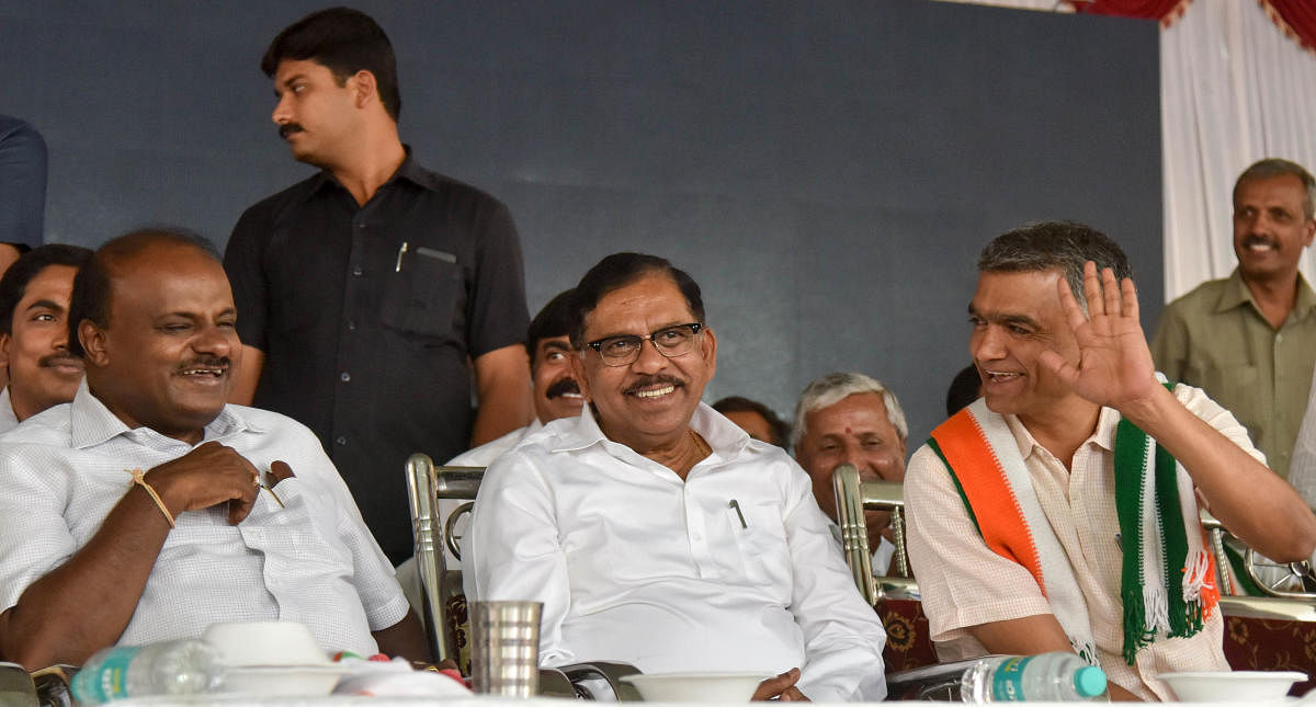 Bengaluru North Lokasabha constituency Congress and JDs Alliance candidate Krishna Byregowda seen with CM H D Kumaraswamy and DCM G Parameshwara, during the Public meeting Hegganahalli, in Bengaluru on Monday. Photo/ B H Shivakumar