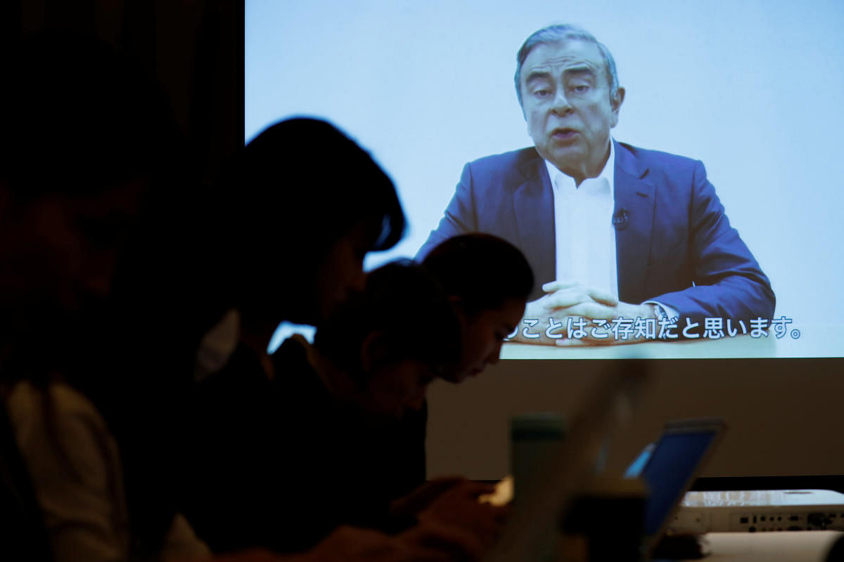 A video statement made by the former Nissan Motor chairman Carlos Ghosn is shown on a screen during a news conference by his lawyers at Foreign Correspondents' Club of Japan in Tokyo, Japan April 9, 2019. REUTERS