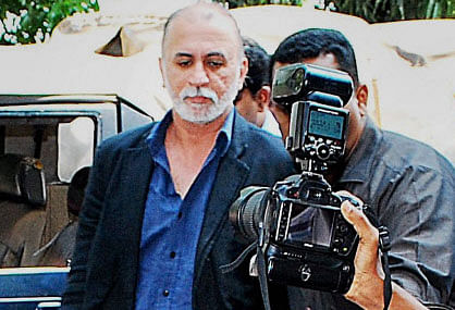 Tarun Tejpal being escorted after he was produced at the Sessions Court in a sexual assault case in Panaji. PTI photo