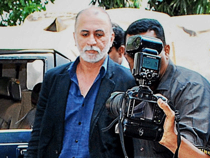 File photo of Tarun Tejpal being escorted after he was produced at the Sessions Court in a sexual assault case in Panaji . PTI
