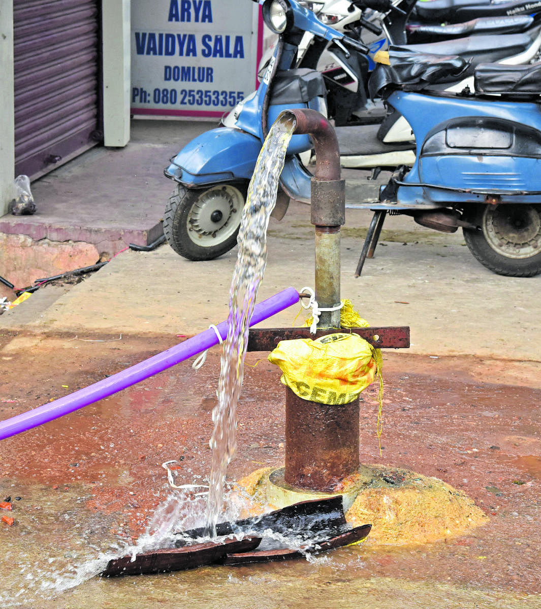 Borewell water pumping out at Old Airport Road, Domlur in Bengaluru. DH photo/S K Dinesh