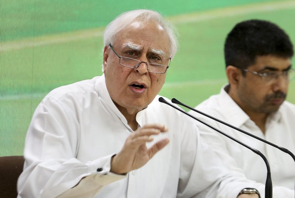 Congress leader Kapil Sibal addresses a press conference at AICC headquarters in New delhi, Tuesday, April 9, 2019. Sibal alleged that demonetisation was the biggest scam in India's history. PTI file photo