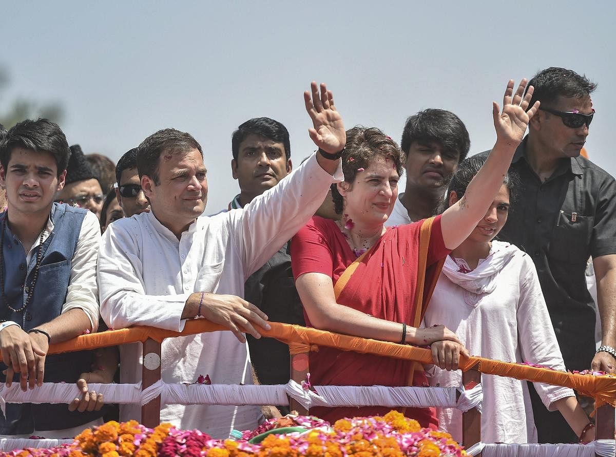 Congress President Rahul Gandhi flanked by party General Secretary Priyanka Gandhi Vadra and her children, embark on a roadshow, before filing the nomination papers for Amethi Lok Sabha seat in Amethi on Wednesday. PTI photo