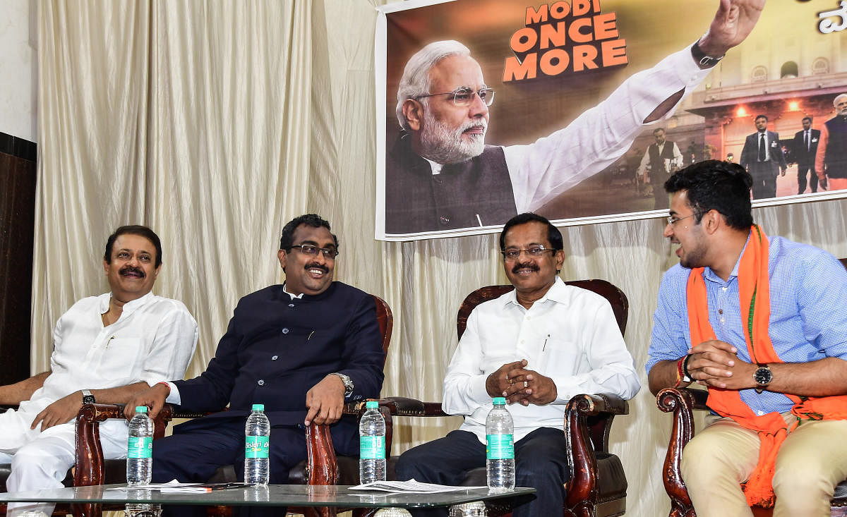 BJP MLA Uday Garudachar, general secretary Ram Madhav, party Bengaluru city chief P N Sadashiva and Bangalore South candidate L S Tejasvi Surya take part in "Modi Once More" interaction, in Bengaluru on Wednesday. DH Photo