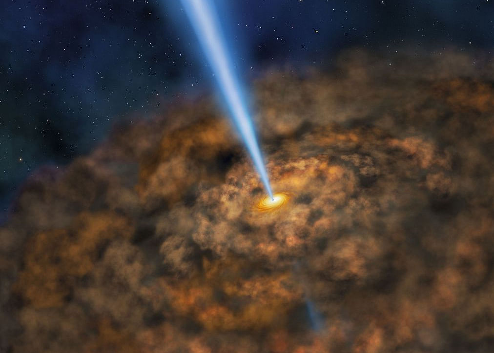 This NASA artist illustration obtained June 14, 2017, shows the thick ring of dust that can obscure the energetic processes that occur near the supermassive black hole of active galactic nuclei. 