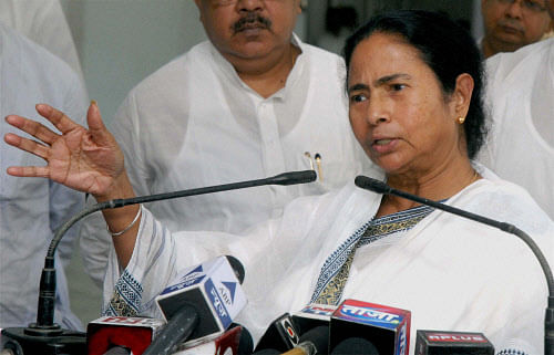 West Bengal Chief Minister Mamata Banerjee interacts with media people regarding the panic of Dengue fever in Kolkata on Friday. PTI Photo