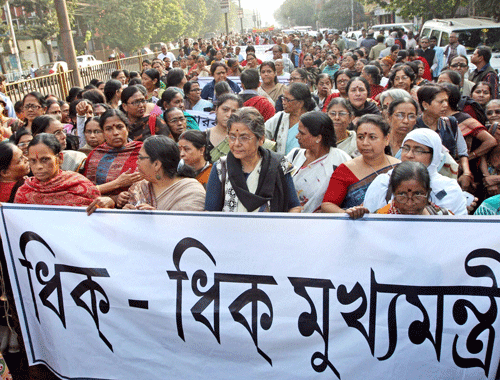 Women participate in a rally to protest against rape of a 16 years old girl, in Kolkata on Wednesday. PTI Photo