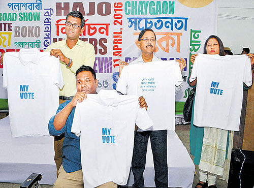 CREATINGAWARENESS: Officials release T-shirts during the launch of 'My Vote Campaign' at Amingaon in Kamrup on Saturday. PTI