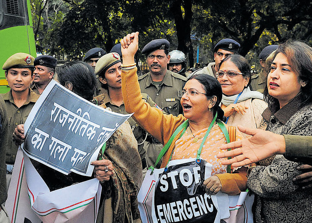 fired up: Trinamool Congress MPs shout slogans during a protest march towards the prime minister's residence in New Delhi on Wednesday, a day after party leader Sudip Bandopadhyay's arrest. PTI