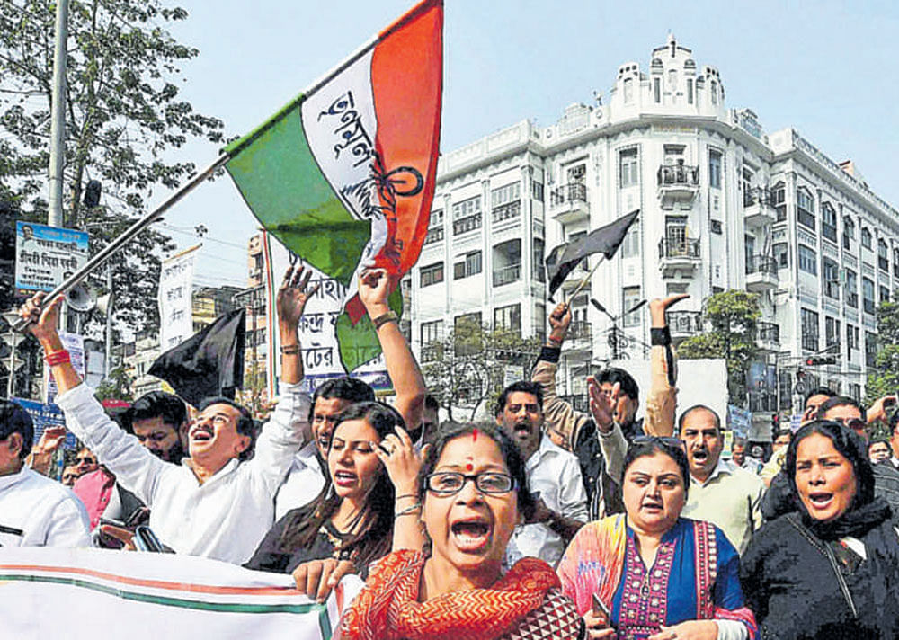 TMC activists protest the arrest of party MP Sudip  Bandopadhyay at a rally in Kolkata on Wednesday. PTI